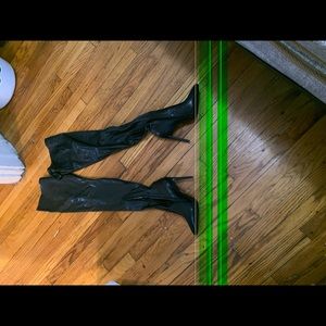 2 pairs of boots size 11 in women and one shirt size large all from Akira